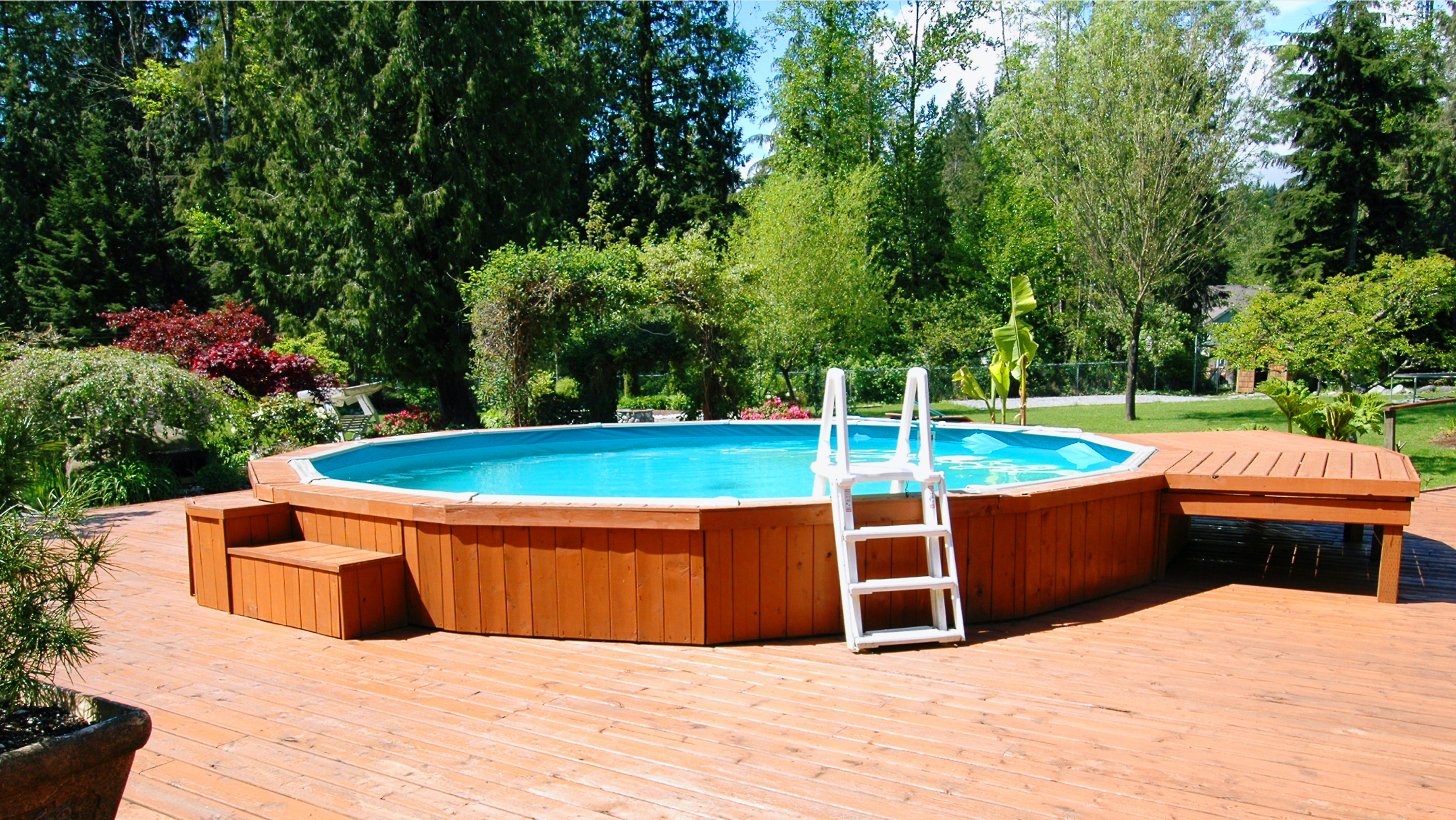 Backyard Above Ground Pool with Deck
